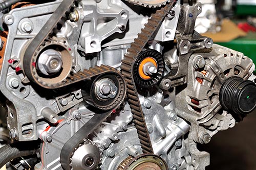 Car engine with timing belt. Tires